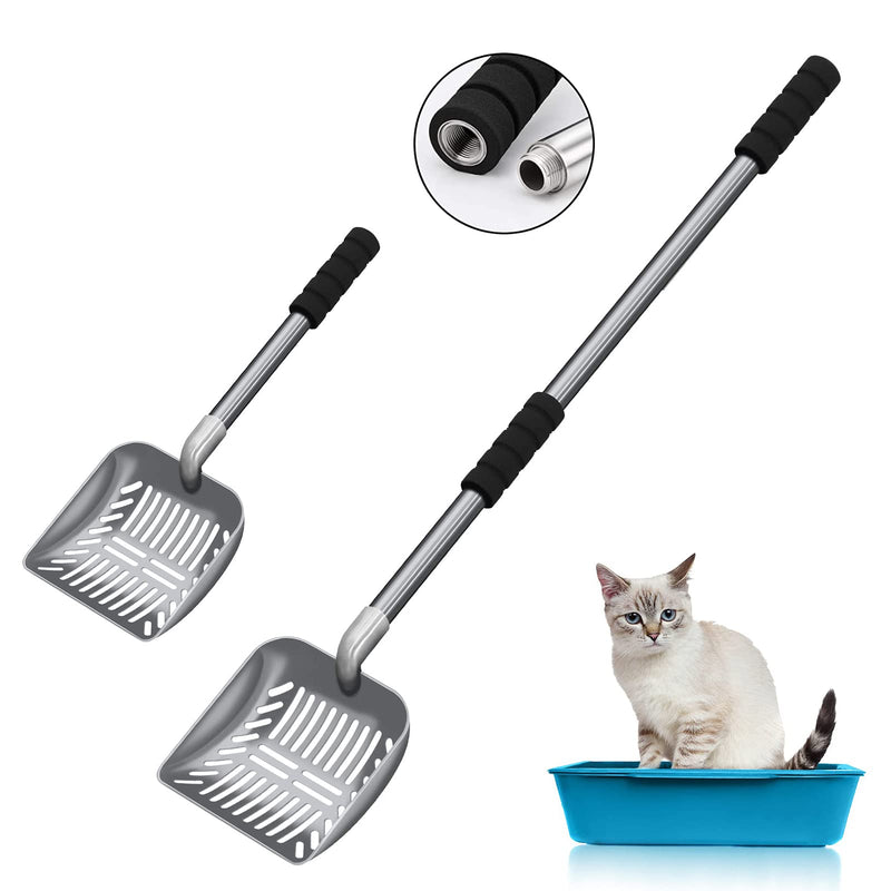 Two metal cat litter scoops with black foam handles and adjustable length poles next to kitten