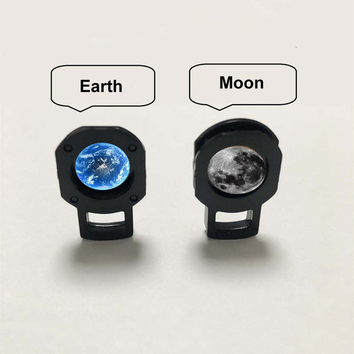 Adjustable space night light with 3W LED projector displays Earth or Moon on any surface
