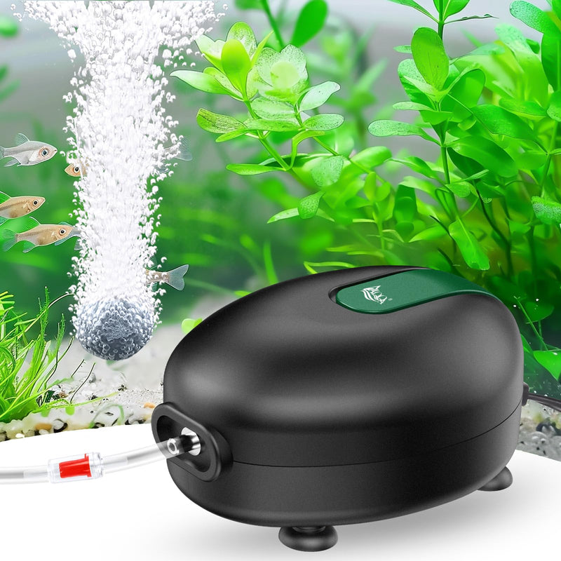 Black aquarium air pump with green button in planted fish tank with bubbles and small fish