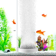 White cylindrical aquarium air stone creating bubble column with goldfish and green plants