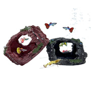 Two decorative aquarium caves in red and black with colorful guppies and shrimp swimming around