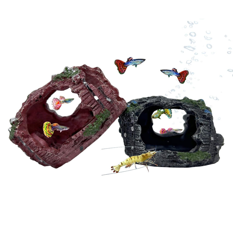 Two decorative aquarium caves in red and black with colorful guppies and shrimp swimming around