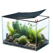 Clear glass aquarium with magnetic mesh cover partially open, showing planted aquascape inside