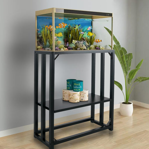 Black metal aquarium stand with colorful fish tank, storage shelf, and plant in modern room