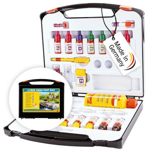 Open aquarium water test kit case showing colorful reagent bottles and testing supplies