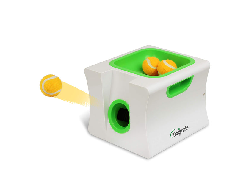 iDogmate automatic ball launcher shooting orange tennis ball with two balls loaded in green tray