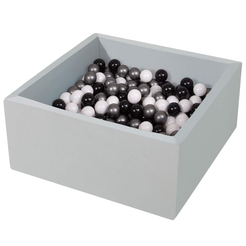 Light gray square memory foam ball pit filled with black white and silver balls