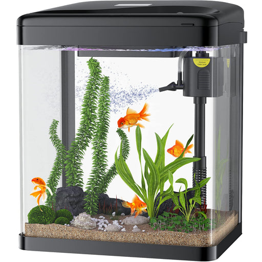 Small aquarium with LED lighting showing goldfish swimming among green plants and decorative rocks