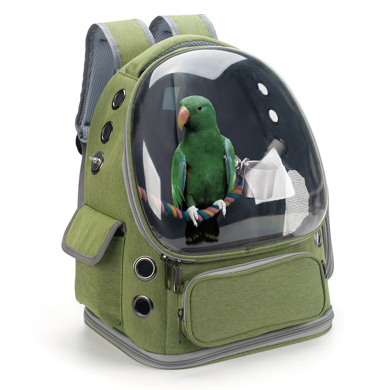 Green bird carrier backpack with clear bubble dome showing green parrot perched inside