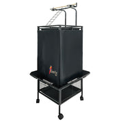 Black bird cage cover on wheeled metal stand with perches and storage shelf