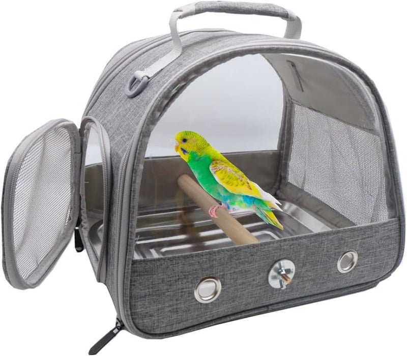 Gray bird travel carrier with transparent dome showing green and yellow budgie perched inside