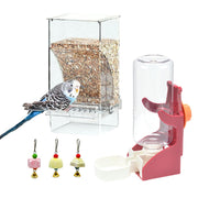 Clear acrylic bird feeder with budgie, red water dispenser, and three colorful hanging toys