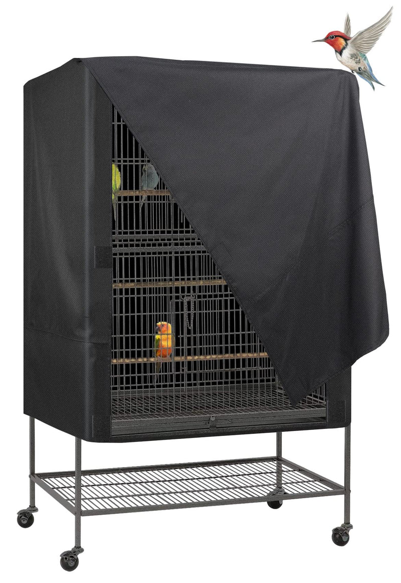 Black bird cage cover partially draped over large flight cage with colorful birds inside