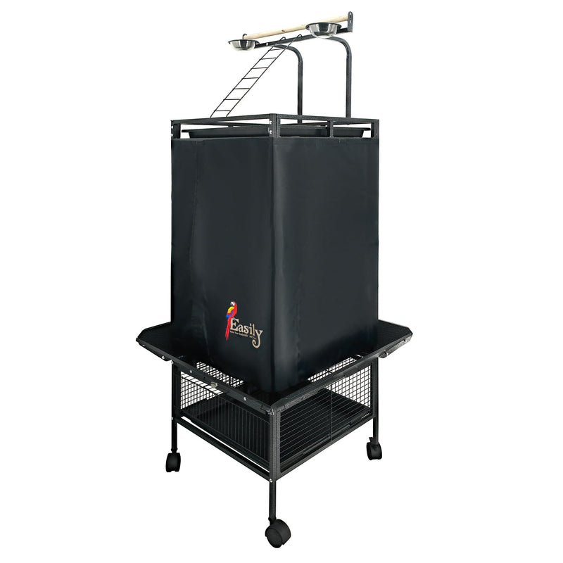 Black fabric bird cage cover on wheeled stand with play top perches and storage basket