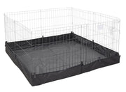 Black canvas exercise pen floor mat with white wire pen enclosure shown from angled view
