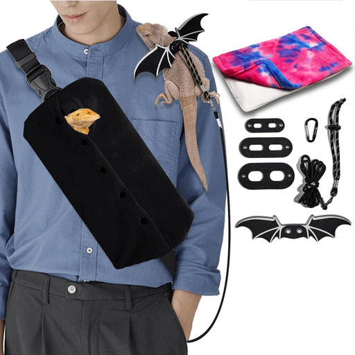 Person wearing black lizard carrier bag with bearded dragon inside, plus bat wings and accessories