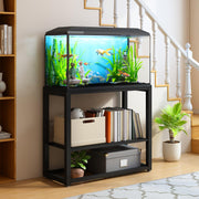 Black metal aquarium stand with fish tank, books and storage in home setting under stairs