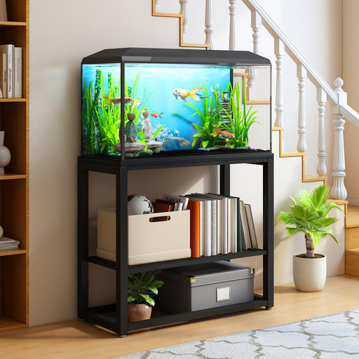 Black metal aquarium stand with fish tank, books and storage in home setting under stairs