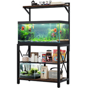 Black metal aquarium stand with two fish tanks, storage shelves, and decorative figurines on top