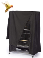 Black waterproof bird cage cover partially draped over tall parrot cage with colorful bird