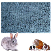 Blue chenille bath mat with small rabbit and guinea pigs showing size comparison