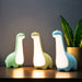 Blue dinosaur touch night light with glowing chest for kids bedroom

