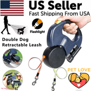 Blue dual dog retractable leash with flashlight and orange/green extending cords for two dogs