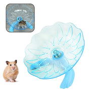 Clear blue hamster exercise wheel with flower-shaped running surface and hamster demonstration