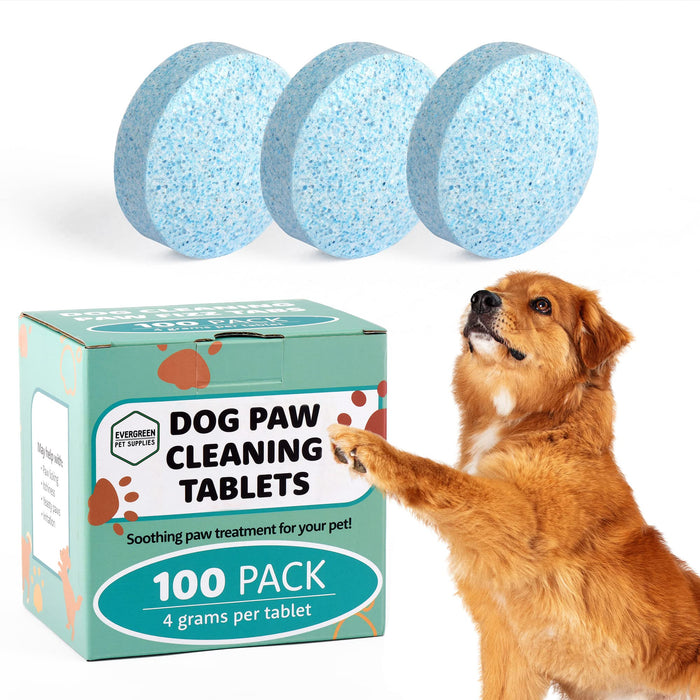 Blue speckled dog paw cleaning tablets with green product box and golden retriever on white