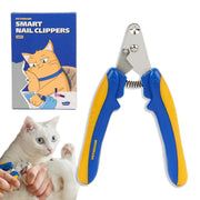 Blue and yellow cat nail clippers with packaging showing orange cat and white kitten being groomed
