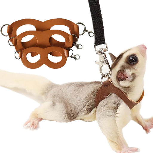 Brown leather small animal harness set with leash displayed on white sugar glider