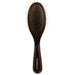 Dark brown wooden paddle brush with golden bristles and cushioned base on white background