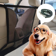 Golden retriever wearing glasses sits in car with mesh dog barrier net protecting front seats