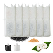 Six white cylindrical pet fountain replacement filters with activated carbon materials shown below