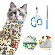 Blue-eyed Ragdoll cat in colorful cartoon print grooming wrap with nail clippers and file tools