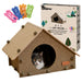 Gray and white cat inside assembled cardboard house with colorful toy balls and product box