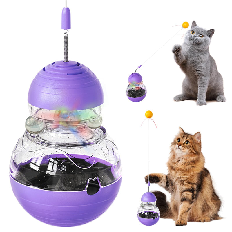 Purple interactive cat toy with transparent middle section and two cats playing with orange balls