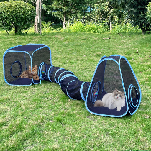 Blue and black mesh cat tunnel playset with two tents connected by spiral tube on grass outdoors