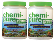Two white containers of Chemi-Pure Green aquarium filter media with green caps and aquatic labels