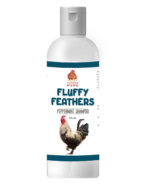 White bottle of Fluffy Feathers peppermint shampoo with rooster illustration and teal accents