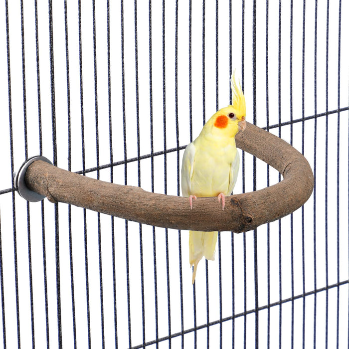 Yellow cockatiel perched on curved natural wood U-shaped perch inside wire bird cage