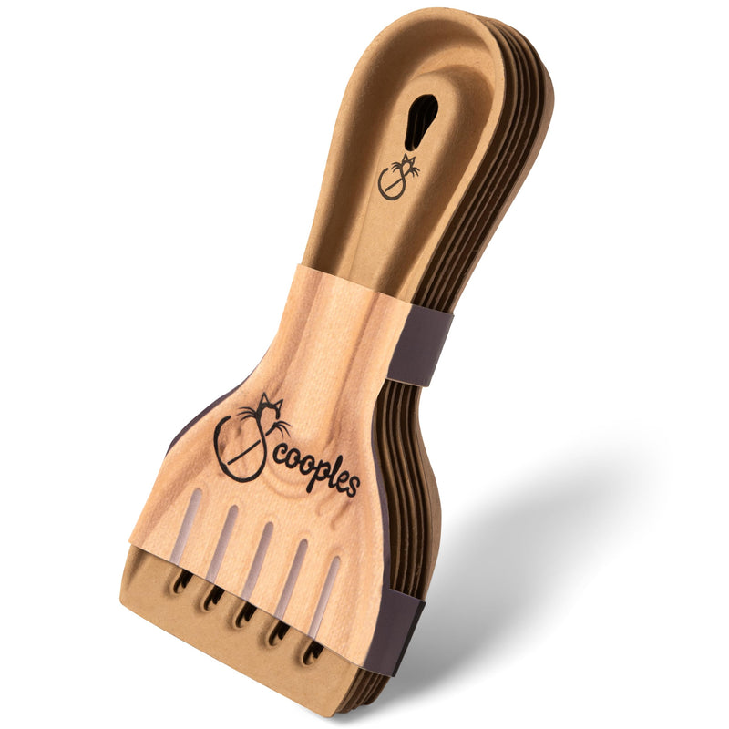 Wooden coconut fiber litter scoop with Cooples logo showing curved handle and bristled head design