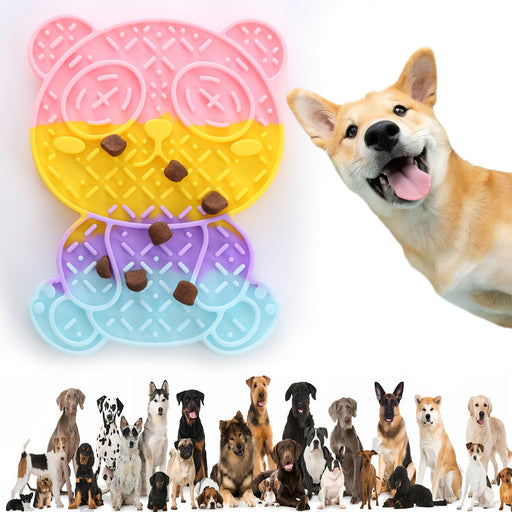 Colorful bear-shaped silicone lick mat in pink, yellow, purple and blue with various dog breeds