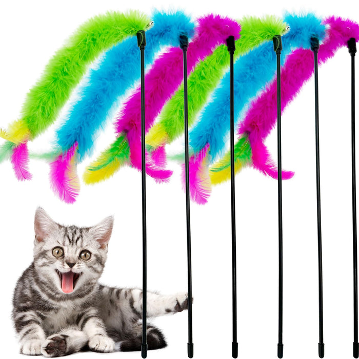 Six colorful feather cat wands in green, blue, and pink with excited gray tabby kitten