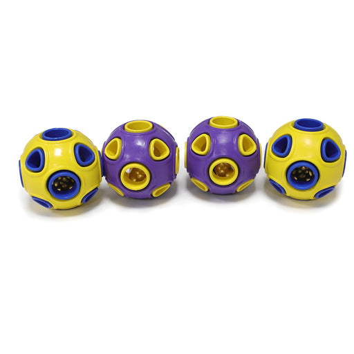 Four colorful rubber ball toys with holes, two yellow and two purple, arranged in a row