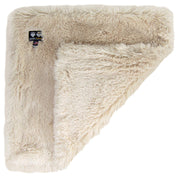 Cream faux fur pet blanket shown unfolded with corner lifted revealing plush texture