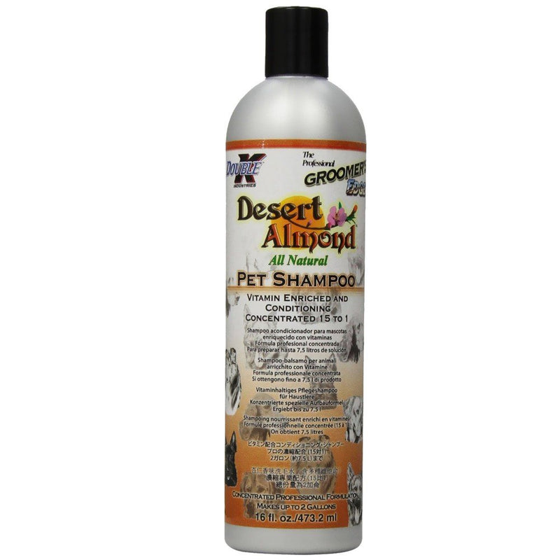 White bottle of Desert Almond pet shampoo with black cap and orange label design