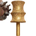 Golden diamond-coated dremel bit with dog paw reaching toward it showing size comparison