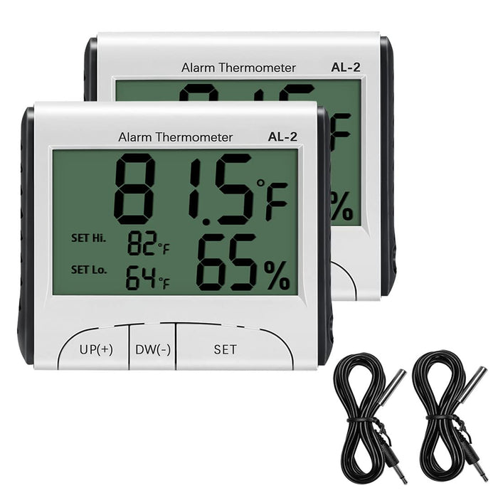 Two white digital thermometers displaying temperature and humidity readings with control buttons