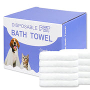 Blue box of disposable pet bath towels with dog and cat shown beside stacked white towels